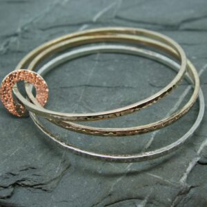 Hand made bangle in silver and gold