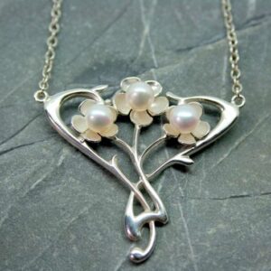 Silver art nouveau necklace set with three pearls