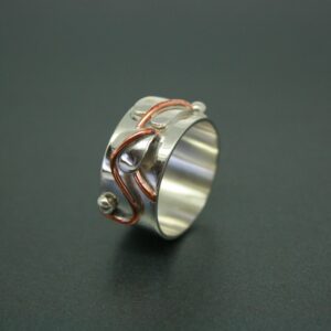 Wide silver and copper leaf ring