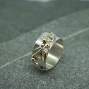 Wide silver and brass leaf ring with fine detail