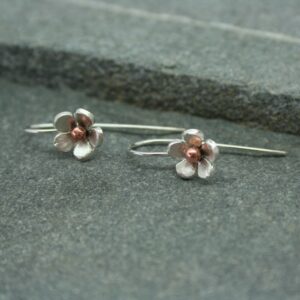 Silver and copper daisy earrings