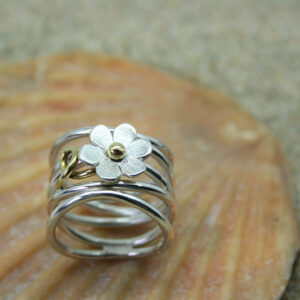 Silver roller coaster ring with silver and brass flower